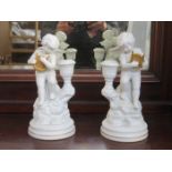 PAIR OF UNGLAZED CHERUB CANDLE STANDS BY GIANNI BENVENUTI OF FRANKLIN MINT,