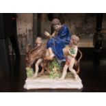 CONTINENTAL STYLE HANDPAINTED AND GILDED GROUP OF A GENT WITH TWO BOYS AND A DONKEY,