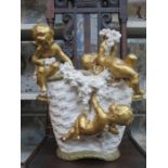 HEAVILY GILDED RELIEF CHERUB DECORATED LARGE CERAMIC TWO HANDLED BASKET, STAMPED AMPHORA, AUSTRIA,