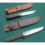 TWO DAGGERS WITH LEATHER SCABBARDS, BOTH STAMPED WITH MAKERS NAME TO BLADES,