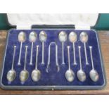CASED SET OF TWELVE HALLMARKED SILVER SPOONS WITH SUGAR TONGS,