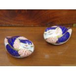PAIR OF ROYAL CROWN DERBY CERAMIC BIRD FORM PAPERWEIGHTS WITH STOPPERS,