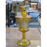 AMBER COLOURED ANTIQUE STEMMED GLASS JAR WITH COVER WITH MARY GREGORY STYLE DECORATION,