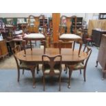 WALNUT VENEERED EXTENDING DINING TABLE,