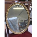 GILDED OVAL WALL MIRROR