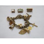 9ct GOLD CHARM BRACELET AND CHARMS PLUS THREE LOOSE GOLD MOUNTED CHARMS