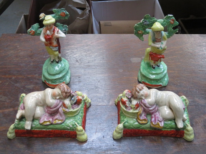 TWO PAIRS OF HANDPAINTED STAFFORDSHIRE FIGURES