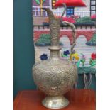 HIGHLY DECORATIVE INDIAN BRASS EWER WITH EMBOSSED ELEPHANT AND MYTHICAL FIGURES,