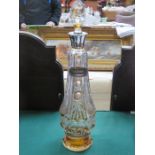 AMBER OVERLAID GLASS DECANTER WITH SILVER COLOURED TOP AND SILVER SHERRY LABEL,