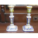 TWO SIMILAR HANDPAINTED FINONZ CANDLESTICKS,