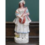 HANDPAINTED ANTIQUE STAFFORDSHIRE FIGURE OF A MUSICIAN,