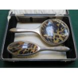 CASED SILVER PLATED AND TORTOISE SHELL EFFECT THREE PIECE DRESSING TABLE SET