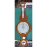 INLAID MAHOGANY WHEEL BAROMETER BY RUSSELL,