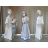 TWO LLADRO GLAZED CERAMIC FIGURES (ONE AT FAULT) AND NAO GLAZED CERAMIC FIGURE