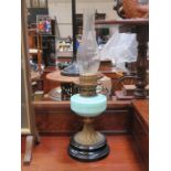 BRASS OIL LAMP WITH TURQUOISE COLOUR RESERVOIR