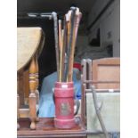 STAND BEARING COAT OF ARMS AND SWAGGER STICK PLUS WALKING STICKS, ETC.