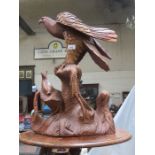 LARGE TREEN CARVING DEPICTING AN EAGLE,