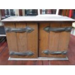 SMALL OAK TWO DOOR CABINET