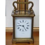 BRASS FRENCH STYLE CARRIAGE CLOCK WITH ENAMELLED DIAL