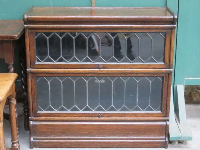 GLOBE WERNICKE TWO SECTION OAK STACKING BOOKCASE WITH LEADED GLASS DOORS