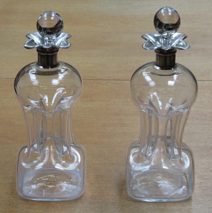 PAIR OF SILVER MOUNTED GLASS DECANTERS WITH STOPPERS, FOR RESTORATION,