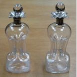 PAIR OF SILVER MOUNTED GLASS DECANTERS WITH STOPPERS, FOR RESTORATION,