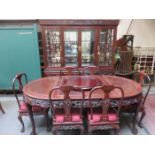 CARVED ANTIQUE ORIENTAL HARDWOOD DINING SUITE COMPRISING OF EXTENDING DINING TABLE WITH TWO LEAVES,