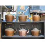 SIX COPPER KETTLES