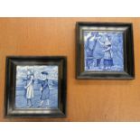PAIR OF BLUE AND WHITE CERAMIC TILES, POSSIBLY BY WEDGWOOD, WITHIN EBONISED FRAMES,