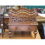 ANTIQUE PIERCEWORK DECORATED WALNUT CANTERBURY (AT FAULT)