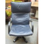 LEATHER UPHOLSTERED SWIVEL ARMCHAIR
