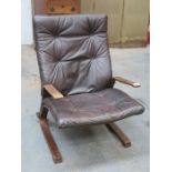 LOW SEATED LEATHER UPHOLSTERED BENTWOOD ARMCHAIR