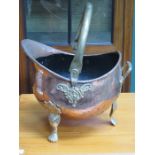 COPPER COAL SCUTTLE WITH BRASS SWING OVER HANDLE AND RAISED CLAW SUPPORTS