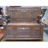 HEAVILY CARVED OAK MONK'S BENCH