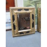 SMALL GILT FRAMED AND BEVELLED WALL MIRROR