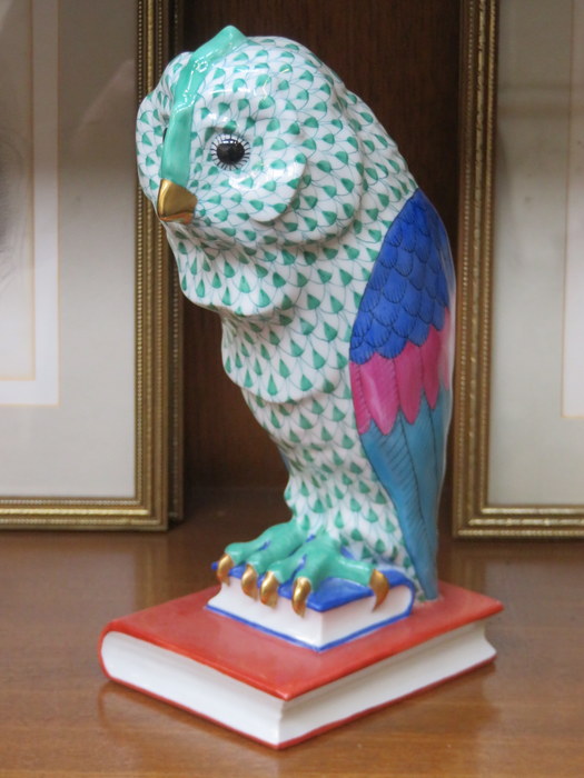LARGE HEREND HANDPAINTED AND GILDED CERAMIC OWL, PERCHED ON TWO GRADUATED BOOKS,
