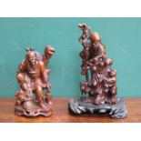 TWO HEAVILY CARVED ORIENTAL FIGURE GROUPS,