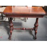 ANTIQUE MAHOGANY FOLD OVER GAMES TABLE WITH FELT LINES INTERIOR