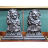 PAIR OF CAST METAL PUNCH & JUDY DOOR STOPS,