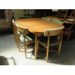 G PLAN EXTENDING DINING TABLE AND SIX CHAIRS