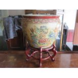 HANDPAINTED AND GILDED ORIENTAL STYLE CERAMIC FISH BOWL ON WOODEN STAND