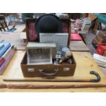 VINTAGE ANTLER TRAVEL CASE CONTAINING SUNDRIES INCLUDING BOWLER HAT, MILITARY CLOTH BADGES, PHOTO,