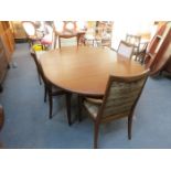 TEAK EXTENDING DINING TABLE AND SIX (FOUR AND TWO) CHAIRS
