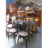 ERCOL GATELEG DINING TABLE AND FOUR CHAIRS