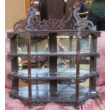 CARVED MAHOGANY PIERCEWORK AND MIRRORBACK WALL MOUNTING SHELF