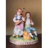 DRESDEN HANDPAINTED AND GILDED CERAMIC FIGURE GROUP DEPICTING A LADY AND GENT,