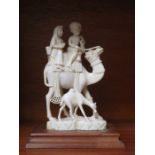 PRE-WAR 1930s NORTH INDIAN IVORY FIGURE GROUP DEPICTING A LADY AND GENT MOUNTED ON CAMEL,