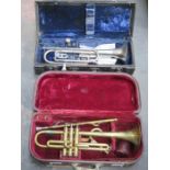 TWO CASED TRUMPETS