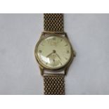 9ct GOLD OMEGA GENTS WRISTWATCH ON 9ct GOLD STRAP