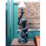 LARGE SPELTER TYPE SEATED FIGURE FORM TABLE LAMP ON STAND,